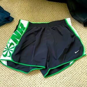 Green Nike running shorts